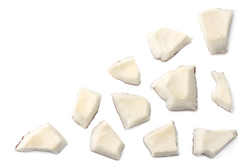 Coconut pieces isolated on white background. top view