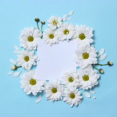 beautiful composition of flowers to the day of the mother. postcard "happy mother's day" on a pastel background with flowers. congratulation. minimalism, top view. flat lay  