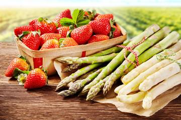 Fresh spring delicacies with asparagus spears - obrazy, fototapety, plakaty
