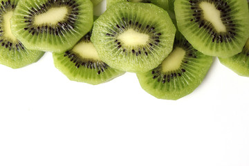  juicy kiwi slices on white background with place for text. vitamins, diet, proper nutrition 