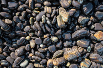Small beautiful pebble stone around the beach