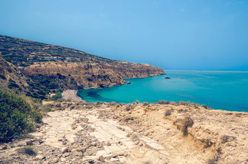 Fototapeta na wymiar Komos, the beautiful long sandy isolated beach of southern Crete which has been awarded by forbes as the best beach of the world.The protected sea turtles (Caretta caretta) lay their eggs there.