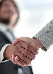 Business people shaking hands isolated on white background