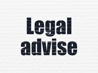 Law concept: Painted black text Legal Advise on White Brick wall background