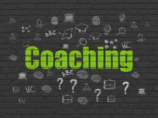 Studying concept: Painted green text Coaching on Black Brick wall background with  Hand Drawn Education Icons