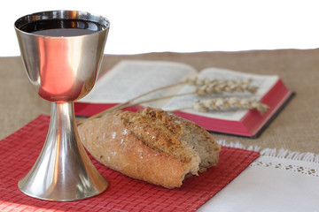 Communion table: caliche , bread and Bible
