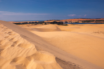 Desert and streaks in Mui Ne, Vietnam is a summer tour where Asian people can enjoy the place.