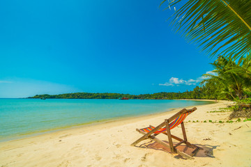 Beautiful tropical beach and sea with coconut palm tree in paradise island