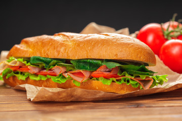 sandwich on a wooden table