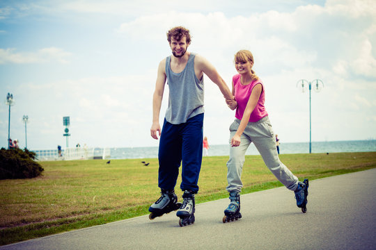 roller skater couple skating outdoor