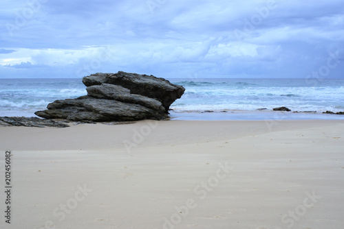 Australian Seascape Of Large Rocks At Beach Heavy Cloudy