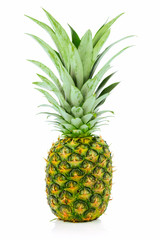 Single ripe and whole pineapple isolated on a white background
