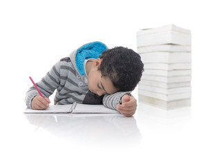 Fototapeta premium Young Boy Tired Studying, and Books