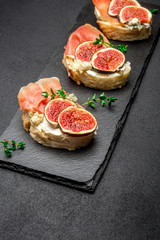 Bruschetta with ham, blue ceese and fresh figs