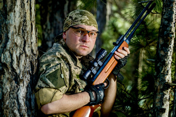  young man with an air rifle