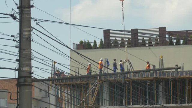 Construction workers on a building