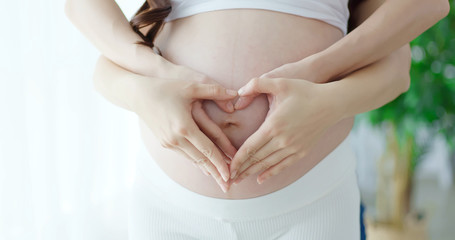 close up pregnant women belly