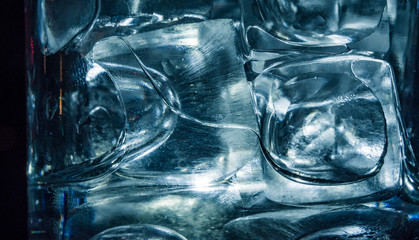 Close-up of blue ice cubes in a glass