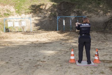 Shooting Police officers shoot from gun to target
