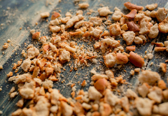 Crumbs on a wooden table