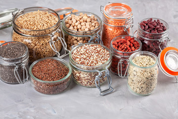 Various superfoods goji berries, quinoa, chia, hemp seeds, chickpeas, oats, linseeds and lantils. Vegan, vegetarian and healthy eating, balanced diet. Organic products concept