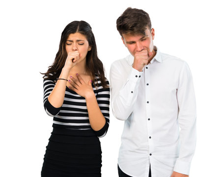 Young couple is suffering with cough and feeling bad on isolated white background