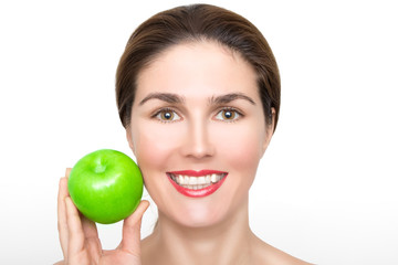 Healthy teeth and green apple