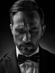 A series of academic studio male portraits.