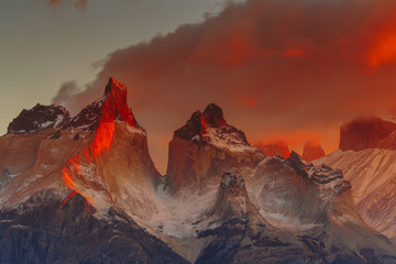 View of Torres Mountains in the Torres del Peine National Park during sunrise. Autumn in Patagonia, the Chilean side