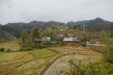 Fototapeta na wymiar Vietnam. Hmong village with rice fields and mountains at Lao Cai province near Sapa.