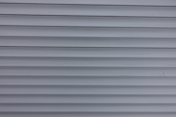 Close view of white plastic roller shutter