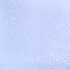 abstract light blue background with glowing dots