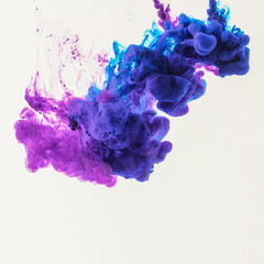 creative design with blue and purple smoke, isolated on white
