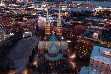 Aerial view, St. John's Church (Johanneksenkirkko) on sunset background, Helsinki, Finland