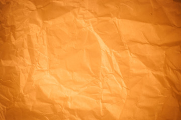 Brown crumpled paper background.