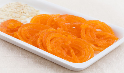 Jalebi, also Know as imarti, imarati, paneer jalebi or zulbia is a Indian sweet food, It is made by deep-frying a wheat flour batter in pretzel or circular shapes