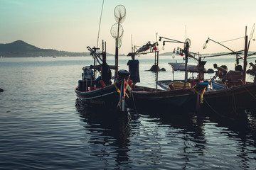 Fototapeta na wymiar Fishing boat In the morning sea South Asia