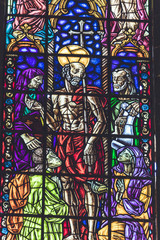 View of stained glass windows inside Jerónimos Monastery.