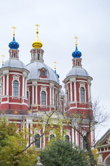 Fototapeta na wymiar St Clement's Church in Moscow, famous orthodox cathedral with beautiful red towers