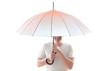 A man under an umbrella, protection from the rain