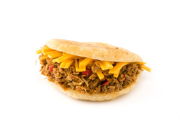 Arepa with shredded beef and cheese isolated on white background. Venezuelan typical food

