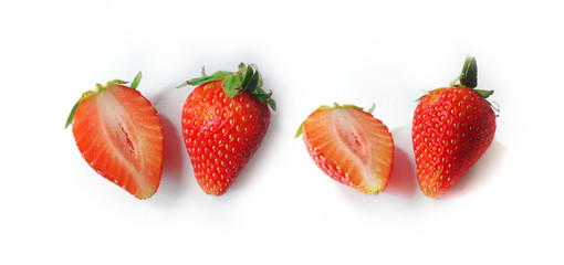 Freshness strawberries series - Strawberries with leaves. Isolated on a white background.