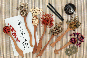 Traditional chinese herbs, acupuncture needles, moxa sticks used moxibustion therapy, feng shui...