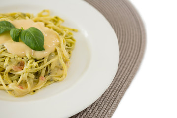 Close up of cooked pasta served with sauce