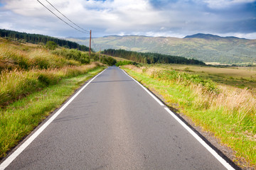 Fototapeta na wymiar Scenic country road in Scottish Highlands