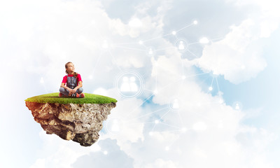 Concept of careless happy childhood with girl dreaming about something