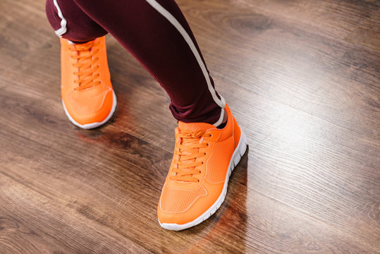 Woman wearing sportswear trainers shoes
