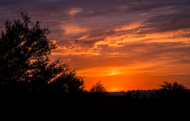 Orange, yellow, red sunset over the Arizona desert