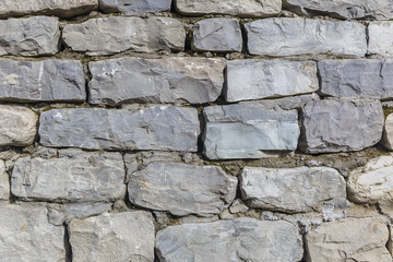 The texture of the wall from the river cobblestones