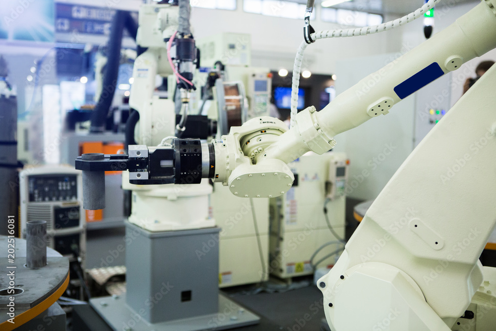 Leinwandbilder A robotic arm. Automatic robot in a smart factory. Assembly line